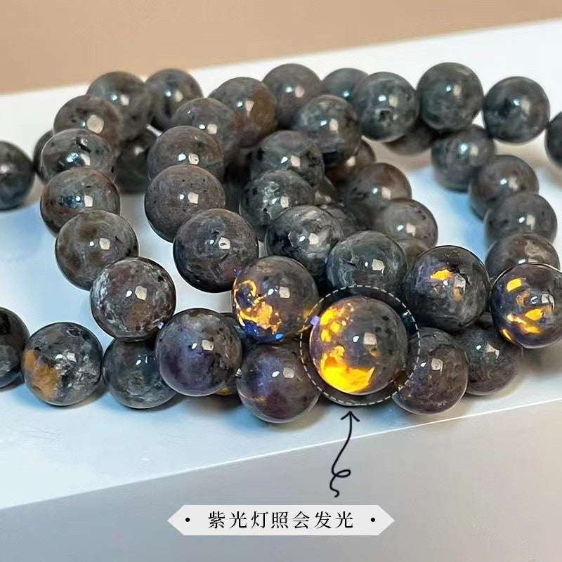 Flame stone bracelet, Holy Mother of Fire, fluorescent stone, purple light, luminous bracelet, ward off evil spirits, clean negative energy.