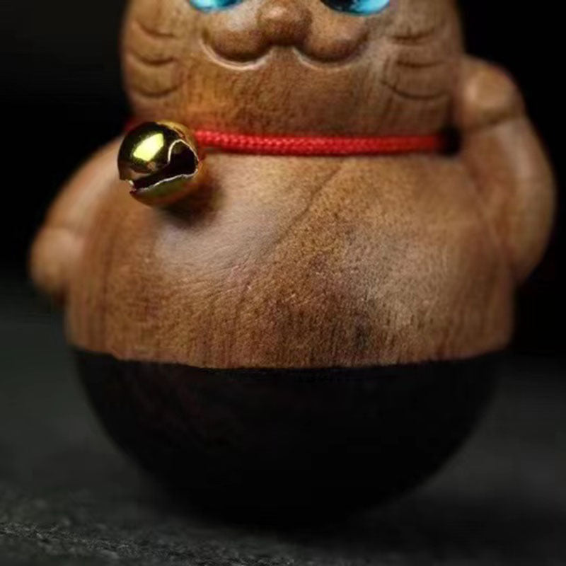 Tumbler wood carving lucky cat