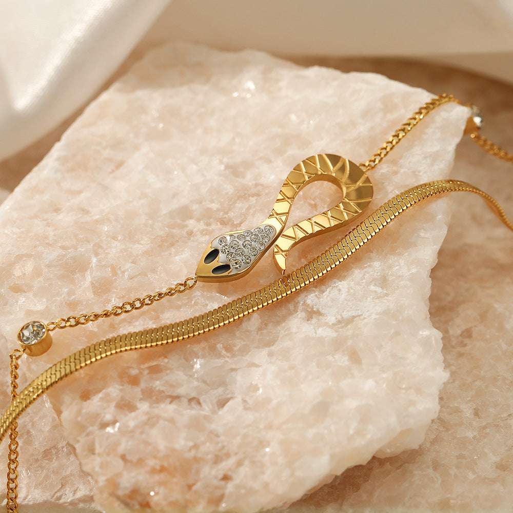 Taoist European and American fashion snake-shaped double-layer stainless steel bracelet with diamonds 18K gold-plated titanium steel snake bone chain women