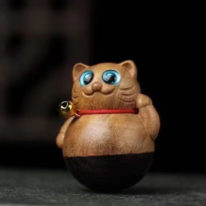 Tumbler wood carving lucky cat
