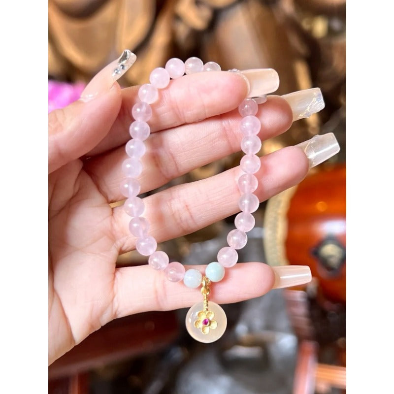 Natural powder crystal safety buckle bracelet, white chalcedony flower pendant, pink crystal bracelet.