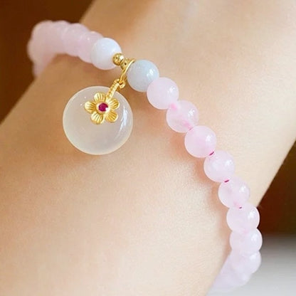 Natural powder crystal safety buckle bracelet, white chalcedony flower pendant, pink crystal bracelet.
