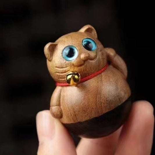 Tumbler wood carving lucky cat