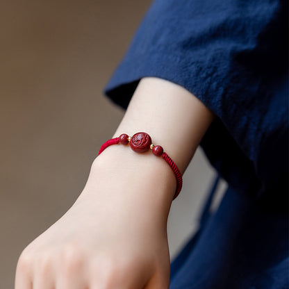 Cinnabar - woven red string bracelet