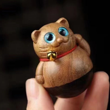 Tumbler wood carving lucky cat